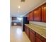 Updated kitchen featuring granite countertops and wood cabinets at 225 W Seminole Blvd # 206, Sanford, FL 32771