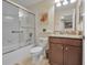 Clean bathroom with shower/tub combo and granite vanity at 2948 Banana Palm Dr, Kissimmee, FL 34747