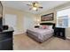 Large bedroom with a king-size bed and plenty of closet space at 2948 Banana Palm Dr, Kissimmee, FL 34747