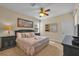 Spacious bedroom with king-size bed and en-suite bathroom at 2948 Banana Palm Dr, Kissimmee, FL 34747