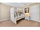 Cozy bedroom with a full-size bunk bed at 2948 Banana Palm Dr, Kissimmee, FL 34747