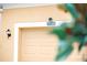 Attached garage with light beige door and house number 2948 at 2948 Banana Palm Dr, Kissimmee, FL 34747