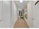 Hallway with carpet and mirror at 2948 Banana Palm Dr, Kissimmee, FL 34747