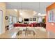 Kitchen island with a double sink overlooking the living and dining rooms at 2948 Banana Palm Dr, Kissimmee, FL 34747