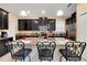 Granite kitchen island with seating for three, perfect for casual dining at 2948 Banana Palm Dr, Kissimmee, FL 34747