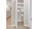 Linen closet with ample shelving for storage at 2948 Banana Palm Dr, Kissimmee, FL 34747