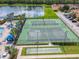 Community tennis and basketball courts with shuffleboard at 2948 Banana Palm Dr, Kissimmee, FL 34747