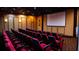 Community theater room with comfortable seating and large screen at 2948 Banana Palm Dr, Kissimmee, FL 34747