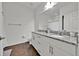 Modern bathroom with double vanity and granite countertop at 3205 Gold Ln, Kissimmee, FL 34747