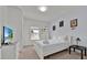 Charming bedroom with a queen bed and TV, featuring a superhero theme at 3205 Gold Ln, Kissimmee, FL 34747