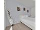 Cozy bedroom with a queen-size bed and full-length mirror at 3205 Gold Ln, Kissimmee, FL 34747
