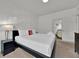 Comfortable bedroom with a king bed and en-suite bathroom at 3205 Gold Ln, Kissimmee, FL 34747