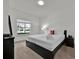 Spacious bedroom with large window and plush bed at 3205 Gold Ln, Kissimmee, FL 34747