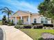Charming community building with benches and landscaping at 3205 Gold Ln, Kissimmee, FL 34747