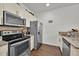 Clean kitchen featuring stainless steel appliances and light wood cabinets at 3205 Gold Ln, Kissimmee, FL 34747