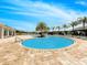 Relaxing kidney-shaped pool with lounge chairs at 3205 Gold Ln, Kissimmee, FL 34747