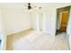 Well-lit bedroom, tile floors, and a double door closet at 3384 Dewberry Ct, Deltona, FL 32738