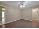 Spacious bedroom with ceiling fan and walk-in closet at 349 Plantation Club Dr, Debary, FL 32713