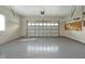 Clean and spacious two-car garage with epoxy floor at 349 Plantation Club Dr, Debary, FL 32713