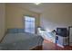 Cozy bedroom with wood floors and ample closet space at 3555 Maribella Dr, New Smyrna Beach, FL 32168
