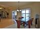 Breakfast nook with glass-top table and view of the backyard at 3555 Maribella Dr, New Smyrna Beach, FL 32168