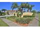 Maribella community entrance with lush landscaping and signage at 3555 Maribella Dr, New Smyrna Beach, FL 32168