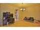 Dining room with hardwood floors and a view of the kitchen at 3555 Maribella Dr, New Smyrna Beach, FL 32168