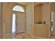 Bright and spacious entryway with tile flooring and neutral walls at 3555 Maribella Dr, New Smyrna Beach, FL 32168