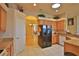 Well-equipped kitchen featuring wood cabinets and granite countertops at 3555 Maribella Dr, New Smyrna Beach, FL 32168