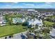 Aerial view of community with waterpark at 421 Southfield St, Kissimmee, FL 34747