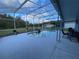 Screened pool and patio area with fountain at 580 Nogales Ct, Kissimmee, FL 34758