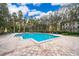 Inviting community pool with plenty of lounge chairs at 754 Siena Palm Dr # 105, Celebration, FL 34747