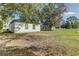 View of the house from the side showcasing a large yard at 762 Toulon Dr, Kissimmee, FL 34759