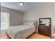 Bedroom with double bed and wood flooring at 762 Toulon Dr, Kissimmee, FL 34759