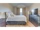 Spacious bedroom with a comfortable bed and ample closet space at 762 Toulon Dr, Kissimmee, FL 34759