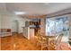 Kitchen and dining area with tile flooring and access to patio at 762 Toulon Dr, Kissimmee, FL 34759