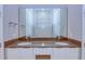Bathroom with double vanity and a large mirror at 7760 Sandy Ridge Dr # 222, Kissimmee, FL 34747
