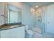 Clean bathroom with a walk-in shower and modern vanity at 7760 Sandy Ridge Dr # 222, Kissimmee, FL 34747
