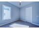 Empty bedroom with neutral walls and a single window at 7760 Sandy Ridge Dr # 222, Kissimmee, FL 34747