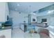 Modern kitchen with island, stainless steel appliances, and breakfast nook at 7760 Sandy Ridge Dr # 222, Kissimmee, FL 34747