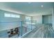 Open loft area overlooking the kitchen and living spaces at 7760 Sandy Ridge Dr # 222, Kissimmee, FL 34747
