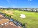 Community overview showcasing homes, golf course and landscape at 8914 Dove Valley Way, Davenport, FL 33896
