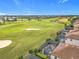 Community overview with golf course and houses with pools at 8914 Dove Valley Way, Davenport, FL 33896