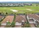 Community overview showing houses near a golf course at 8914 Dove Valley Way, Davenport, FL 33896