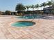 Community pool and spa with surrounding patio at 9004 Shine Dr, Kissimmee, FL 34747