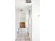 Clean hallway with tile floors and access to bedrooms at 1403 Amaros Ave, Orlando, FL 32811