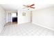 Spacious living room with tile floors and ceiling fan at 1403 Amaros Ave, Orlando, FL 32811