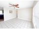 Bright living room with tile floors and ceiling fan at 1403 Amaros Ave, Orlando, FL 32811