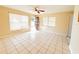 Bright living room featuring tile floors and ceiling fan at 1403 Amaros Ave, Orlando, FL 32811
