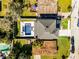 Aerial view of a house with a pool and backyard at 1606 Hart Ln, Orlando, FL 32804